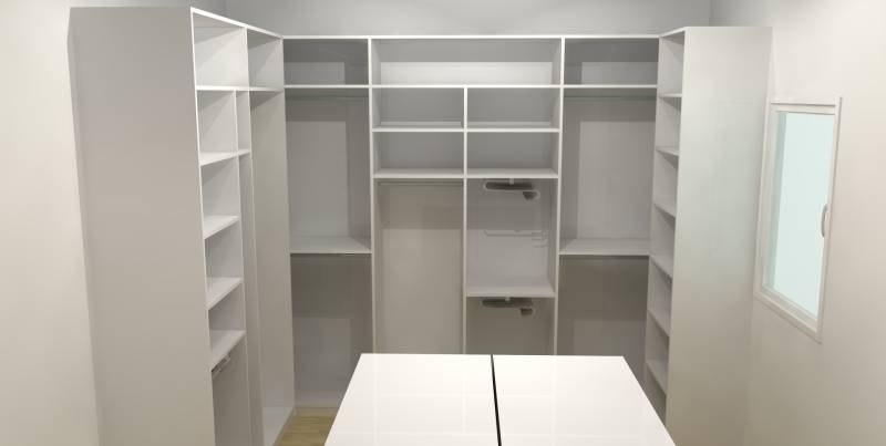 Conception d'un dressing en U avec ilot dans une maison à Bages